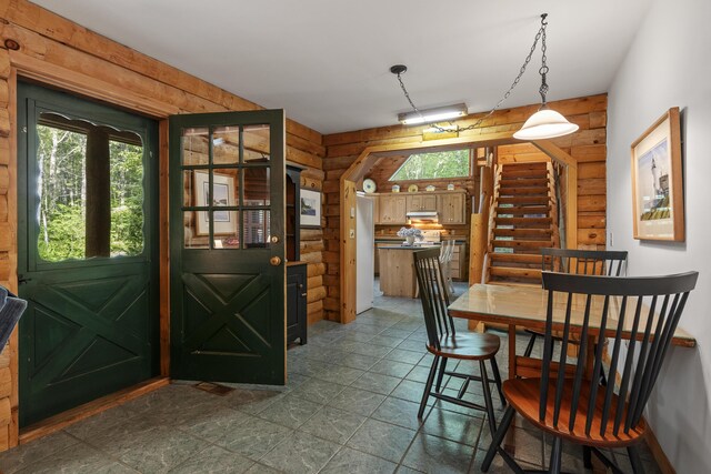 19 Fox Ln, Bremen, ME 04551 - dining area featuring rustic walls and stairway