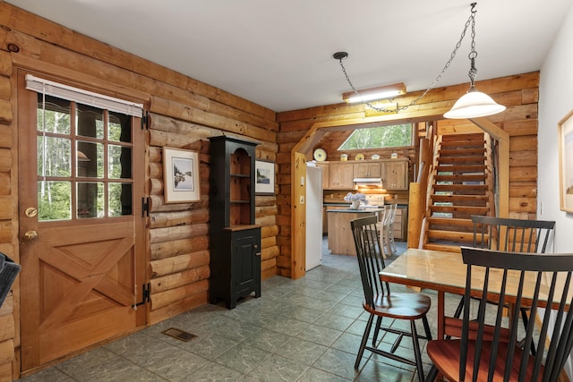19 Fox Ln, Bremen, ME 04551 - dining area with log walls and stairway