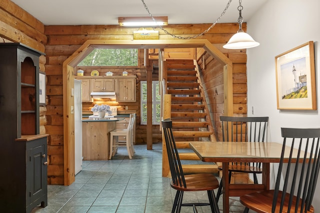 19 Fox Ln, Bremen, ME 04551 - dining area with rustic walls and stairs