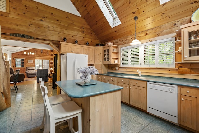 19 Fox Ln, Bremen, ME 04551 - kitchen featuring white appliances, open shelves, wooden walls, a skylight, and tile patterned floors