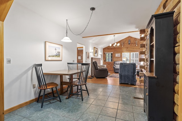 19 Fox Ln, Bremen, ME 04551 - tiled dining space featuring lofted ceiling and a chandelier