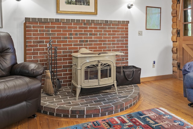 19 Fox Ln, Bremen, ME 04551 - detailed view of a wood stove and wood finished floors