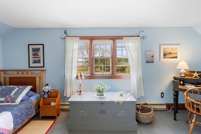 351 Mill Creek Rd, Islesboro, ME 04848 - bedroom featuring lofted ceiling, a baseboard heating unit, and wood finished floors