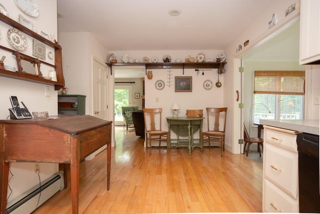 3 Fenderson Hill N, Wilton, ME 04294 - dining area featuring a baseboard radiator and light wood-style floors