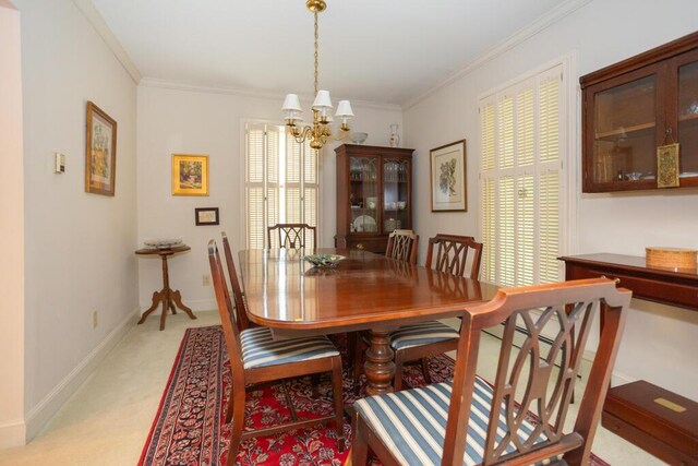 3 Fenderson Hill N, Wilton, ME 04294 - dining room featuring a chandelier, crown molding, and light carpet