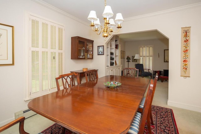 3 Fenderson Hill N, Wilton, ME 04294 - dining space featuring a chandelier, a baseboard radiator, carpet flooring, and crown molding