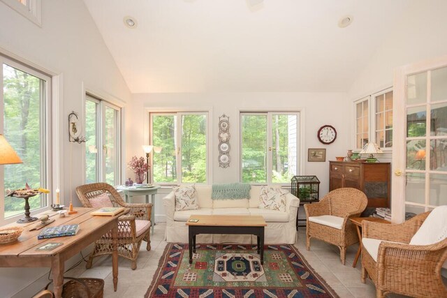 3 Fenderson Hill N, Wilton, ME 04294 - sunroom / solarium featuring vaulted ceiling, healthy amount of natural light, tile patterned flooring, and french doors