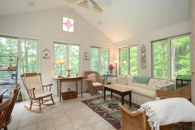 3 Fenderson Hill N, Wilton, ME 04294 - living room with healthy amount of natural light, high vaulted ceiling, light tile patterned flooring, and a ceiling fan