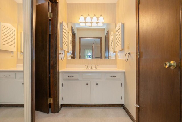 3 Fenderson Hill N, Wilton, ME 04294 - bathroom with vanity and a chandelier