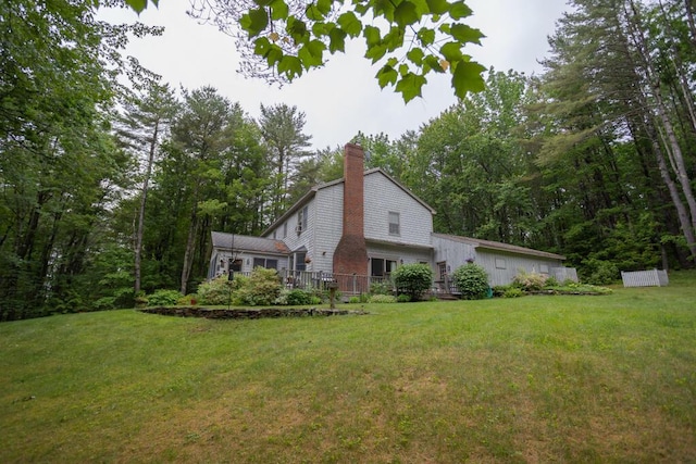3 Fenderson Hill N, Wilton, ME 04294 - view of side of property featuring a chimney and a lawn
