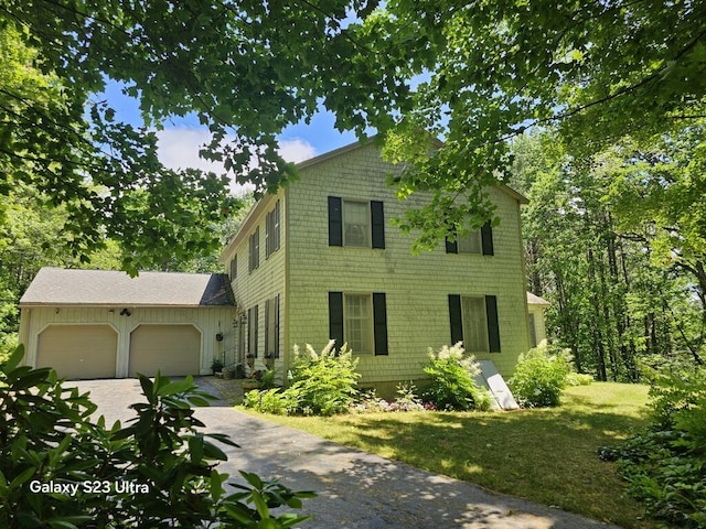 3 Fenderson Hill N, Wilton, ME 04294 - view of front facade with an attached garage, driveway, and a front yard