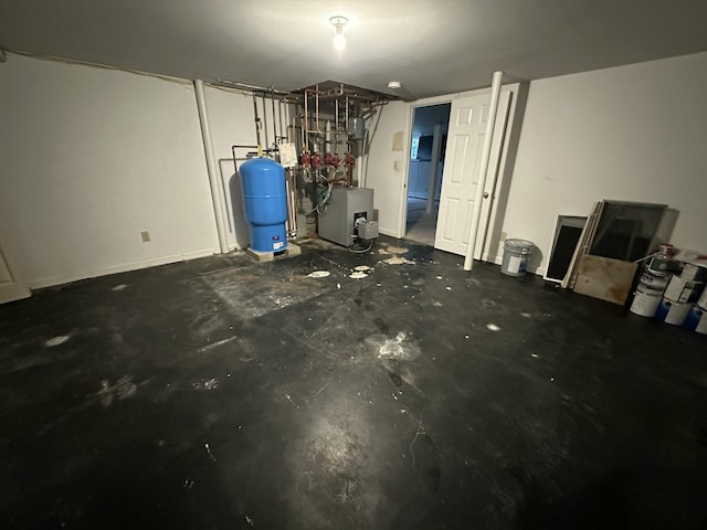 53 Pennacook Cir, Wells, ME 04090 - garage featuring a heating unit and baseboards