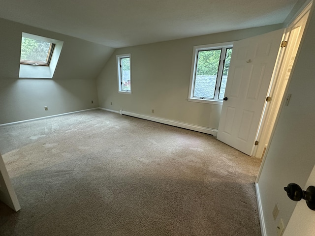 53 Pennacook Cir, Wells, ME 04090 - bonus room featuring baseboard heating, lofted ceiling, carpet floors, and a skylight