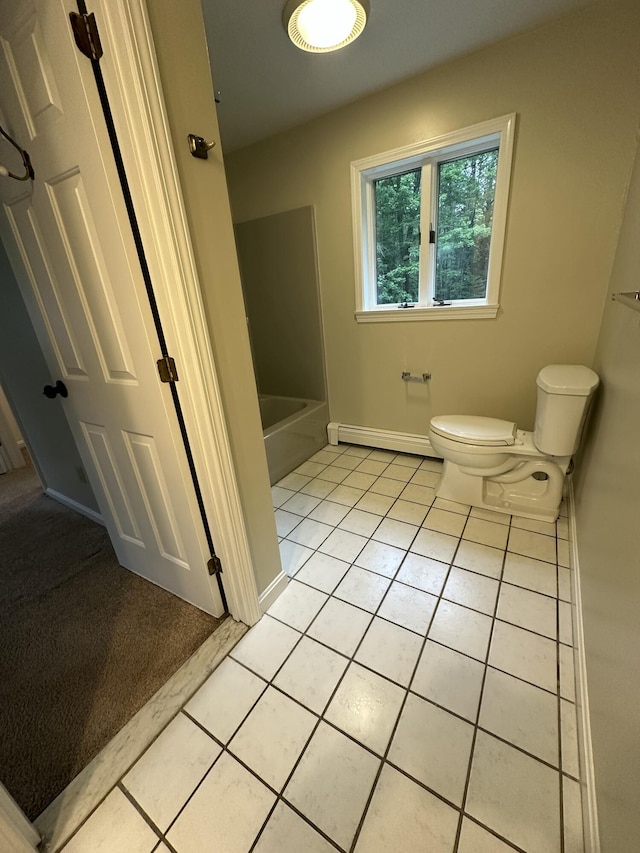 53 Pennacook Cir, Wells, ME 04090 - full bath with baseboard heating, tile patterned floors, a tub to relax in, and a shower