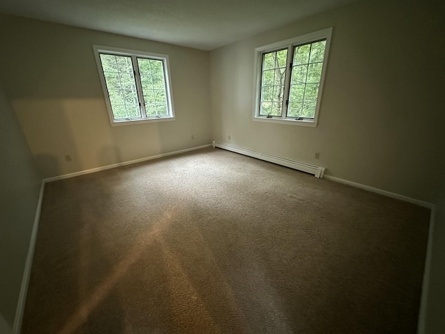 53 Pennacook Cir, Wells, ME 04090 - carpeted empty room featuring a baseboard radiator and plenty of natural light