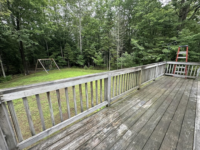 53 Pennacook Cir, Wells, ME 04090 - wooden deck with a playground and a yard