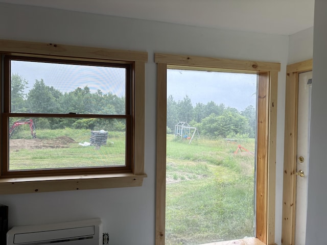 440 Temple Rd, Wilton, ME 04294 - doorway featuring healthy amount of natural light and a wall mounted air conditioner