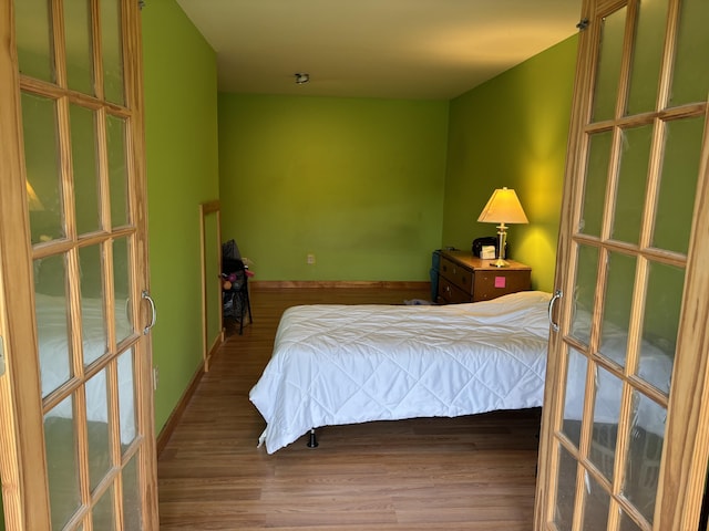 440 Temple Rd, Wilton, ME 04294 - bedroom with wood finished floors and baseboards
