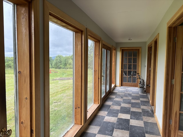 440 Temple Rd, Wilton, ME 04294 - unfurnished sunroom featuring plenty of natural light and stone finish flooring