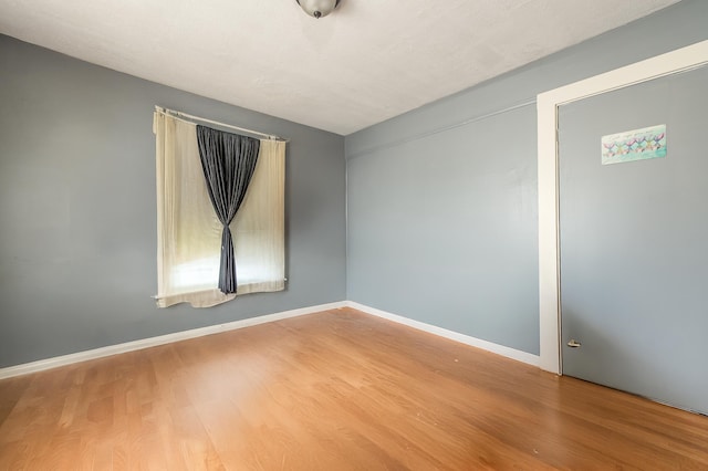 323 Cumberland St, Rumford, ME 04276 - spare room with wood finished floors and baseboards