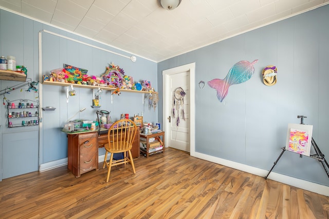 323 Cumberland St, Rumford, ME 04276 - home office with wood finished floors and a decorative wall