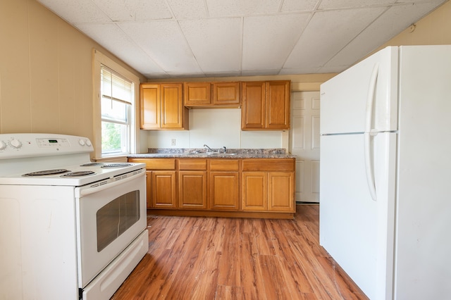 323 Cumberland St, Rumford, ME 04276 - kitchen featuring white appliances and light wood-style floors
