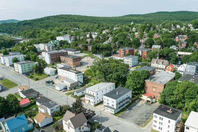 323 Cumberland St, Rumford, ME 04276 - aerial view of a heavily wooded area