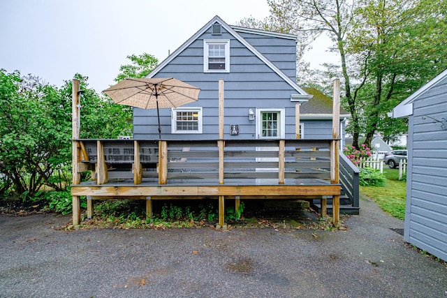 51 Burwell Ave, South Portland, ME 04106 - rear view of house featuring a wooden deck