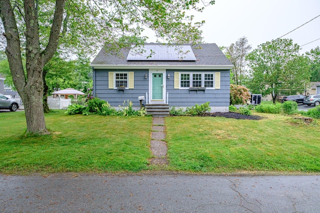 51 Burwell Ave, South Portland, ME 04106 - bungalow with solar panels and roof with shingles
