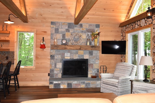 107 Shady Ln, Newport, ME 04953 - living room featuring wood finished floors, wooden ceiling, healthy amount of natural light, wood walls, and a stone fireplace