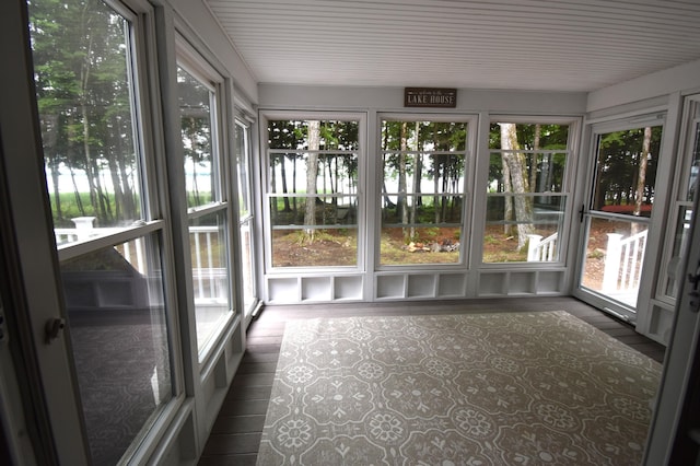 107 Shady Ln, Newport, ME 04953 - unfurnished sunroom with a water view and wood finished floors