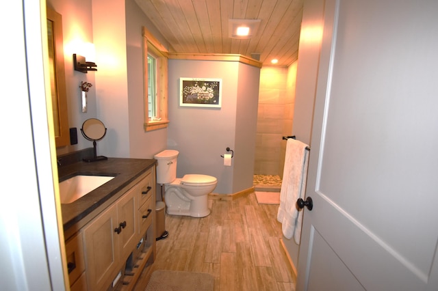 107 Shady Ln, Newport, ME 04953 - full bath with vanity, a tile shower, wood finished floors, and wood ceiling