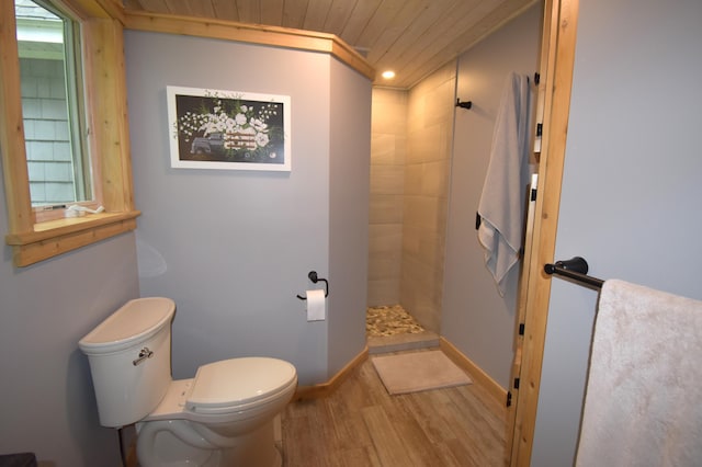 107 Shady Ln, Newport, ME 04953 - full bath with wooden ceiling, wood finished floors, and a tile shower