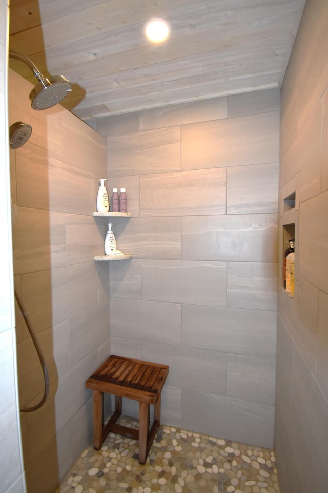 107 Shady Ln, Newport, ME 04953 - bathroom featuring a tile shower and tile patterned floors