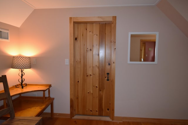 107 Shady Ln, Newport, ME 04953 - corridor with vaulted ceiling and wood finished floors