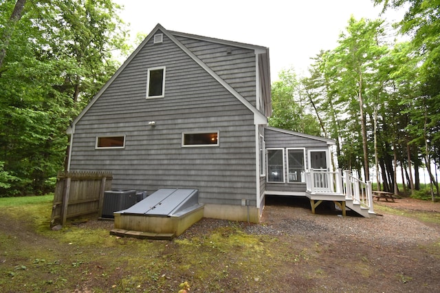 107 Shady Ln, Newport, ME 04953 - rear view of property with a sunroom