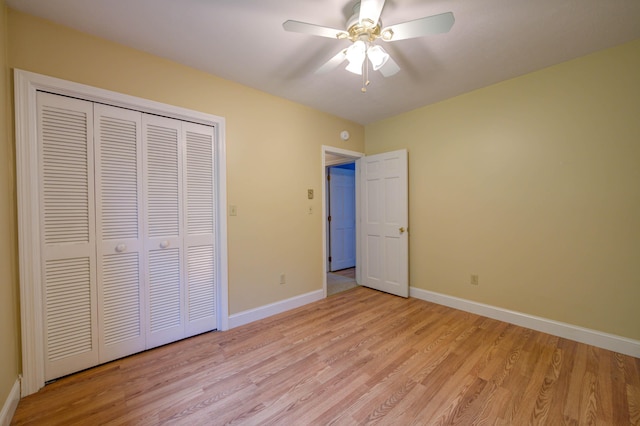 4 Cheshire Meadows Ln Unit 4, Kennebunk, ME 04043 - unfurnished bedroom featuring light wood-style flooring, a closet, and a ceiling fan