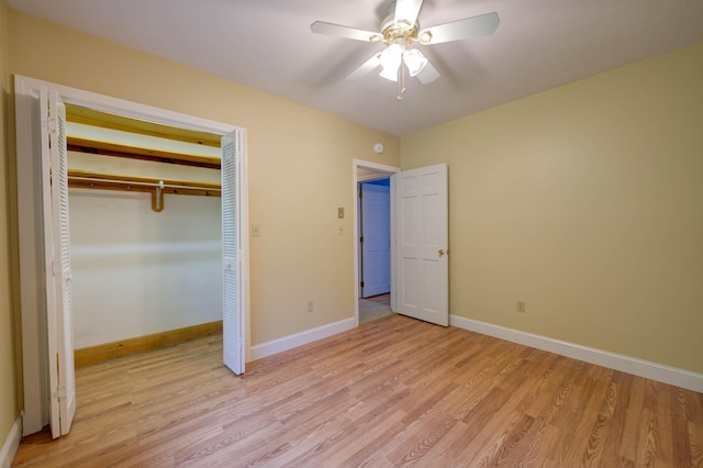 4 Cheshire Meadows Ln Unit 4, Kennebunk, ME 04043 - unfurnished bedroom with light wood-type flooring, a closet, and ceiling fan