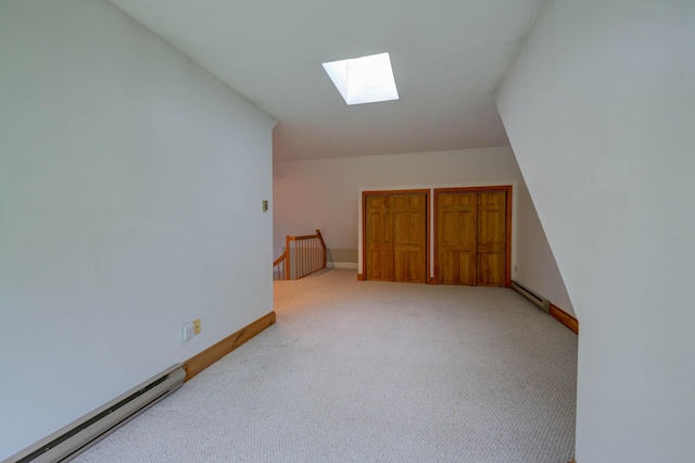 4 Cheshire Meadows Ln Unit 4, Kennebunk, ME 04043 - bonus room with a baseboard heating unit, a skylight, and light carpet