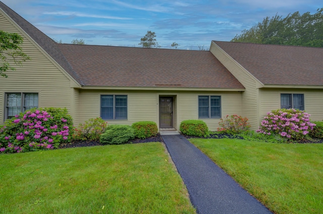 4 Cheshire Meadows Ln Unit 4, Kennebunk, ME 04043 - view of front of home featuring a front lawn and a shingled roof