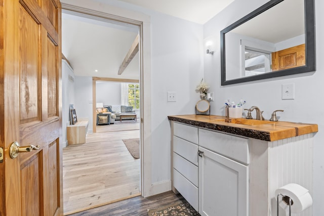 665 Hendricks Hill Rd, Southport, ME 04576 - bathroom featuring wood finished floors and vanity