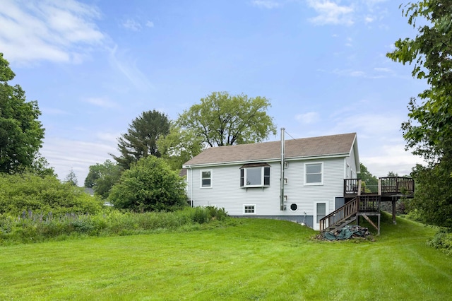 94 Depot St, Waldoboro, ME 04572 - rear view of house with a wooden deck, stairway, and a lawn