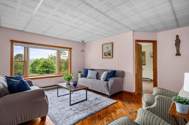 94 Depot St, Waldoboro, ME 04572 - living room featuring light wood-style flooring and a baseboard radiator