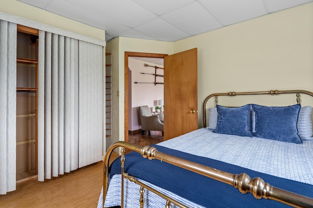94 Depot St, Waldoboro, ME 04572 - bedroom with wood finished floors, a closet, and a drop ceiling