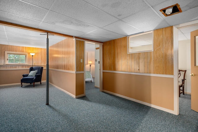 94 Depot St, Waldoboro, ME 04572 - interior space with wood walls, carpet, and a paneled ceiling