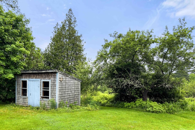 94 Depot St, Waldoboro, ME 04572 - view of green lawn featuring a storage shed