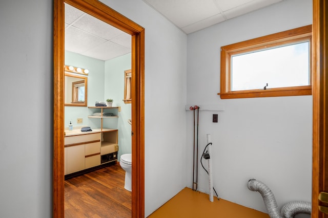 94 Depot St, Waldoboro, ME 04572 - bathroom with a paneled ceiling, wood finished floors, and vanity