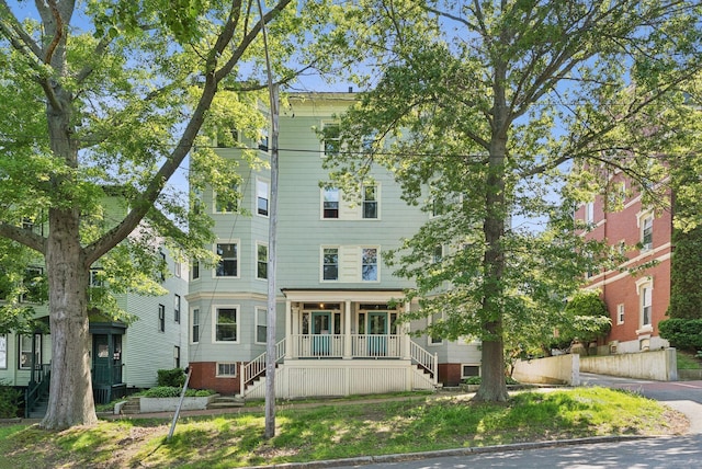 32 State St Unit 5, Portland, ME 04101 - back of property with stairway and covered porch