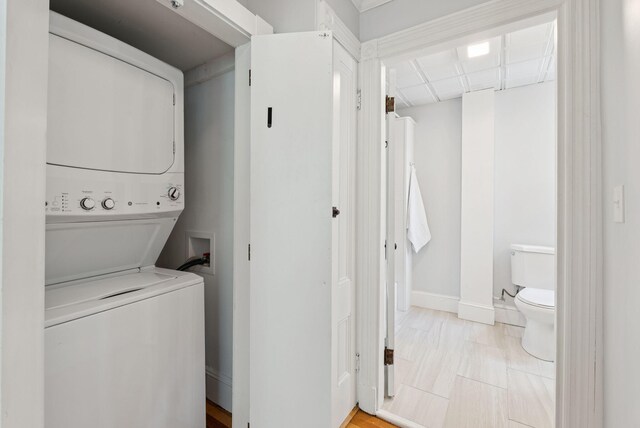 32 State St Unit 5, Portland, ME 04101 - washroom with stacked washer / drying machine and baseboards
