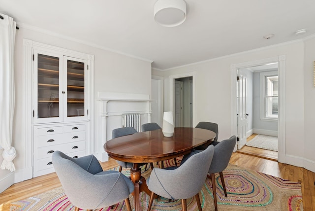 32 State St Unit 5, Portland, ME 04101 - dining room with light wood-style flooring and ornamental molding